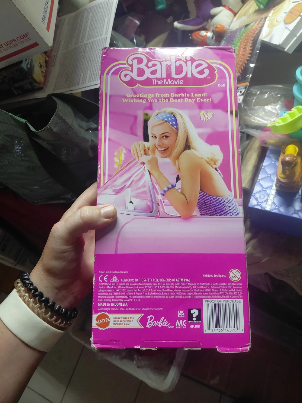 the collectible Barbie The Movie doll featuring Margot Robbie wearing her iconic
